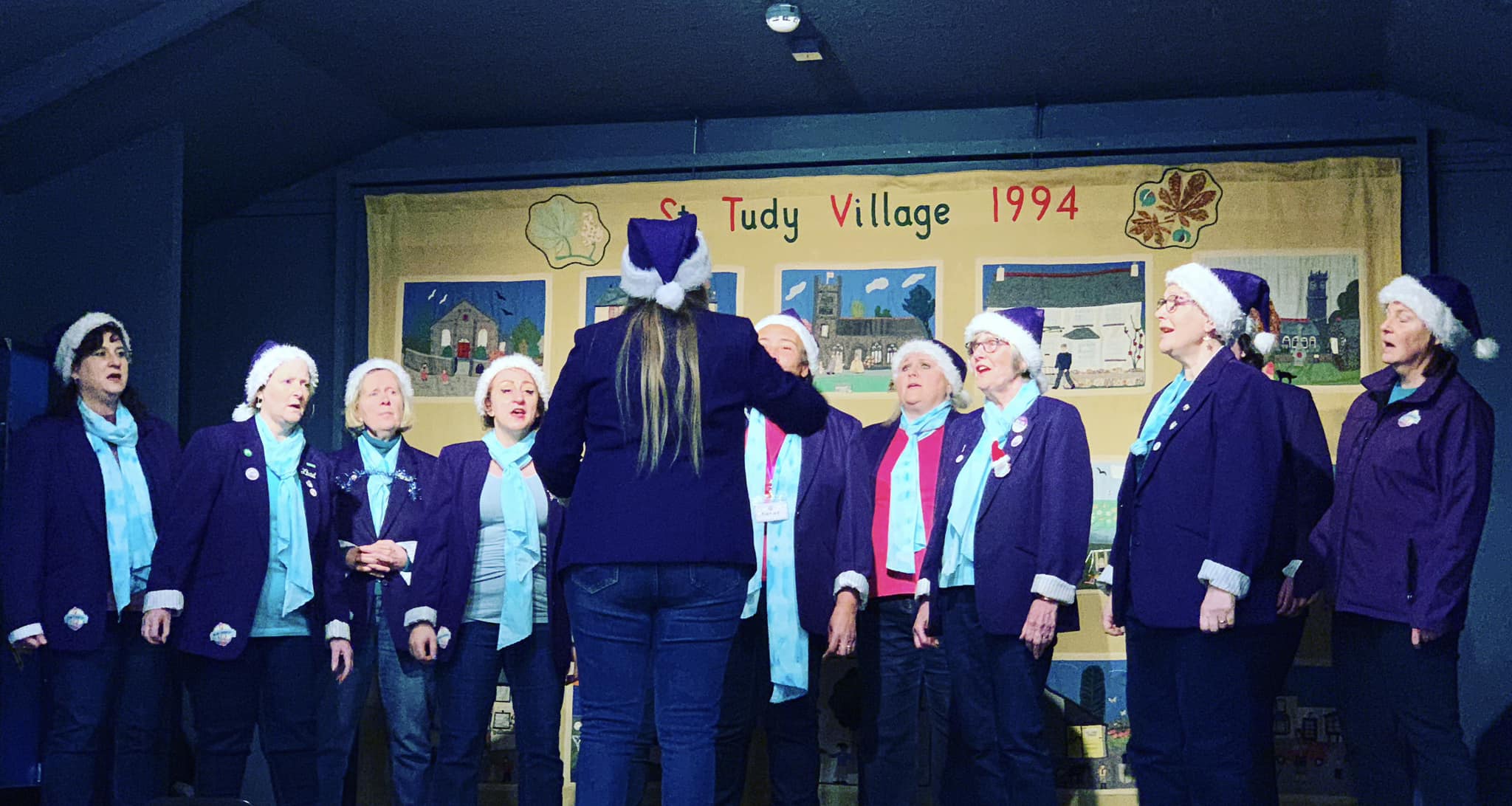 women's choir in Cornwall, More Harmony performing in St Tudy