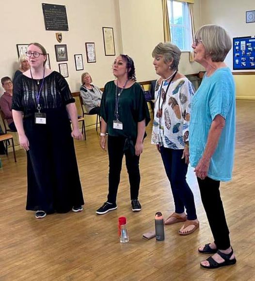 More Harmony's in-house quartet, Generation Gap, rehearsing in front of the choir in Wadebridge, Cornwall
